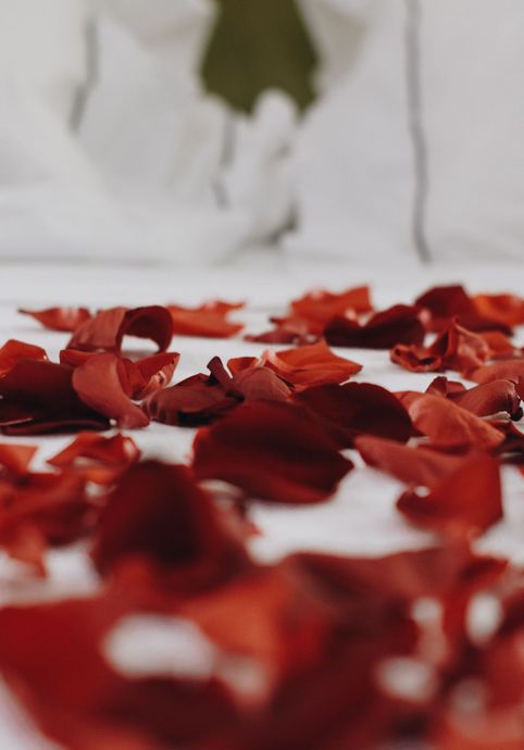 bed with rose petals